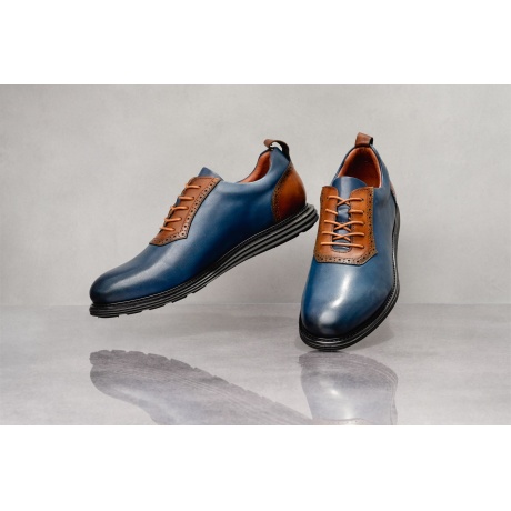 FW24 Väino Navy Tan.jpeg